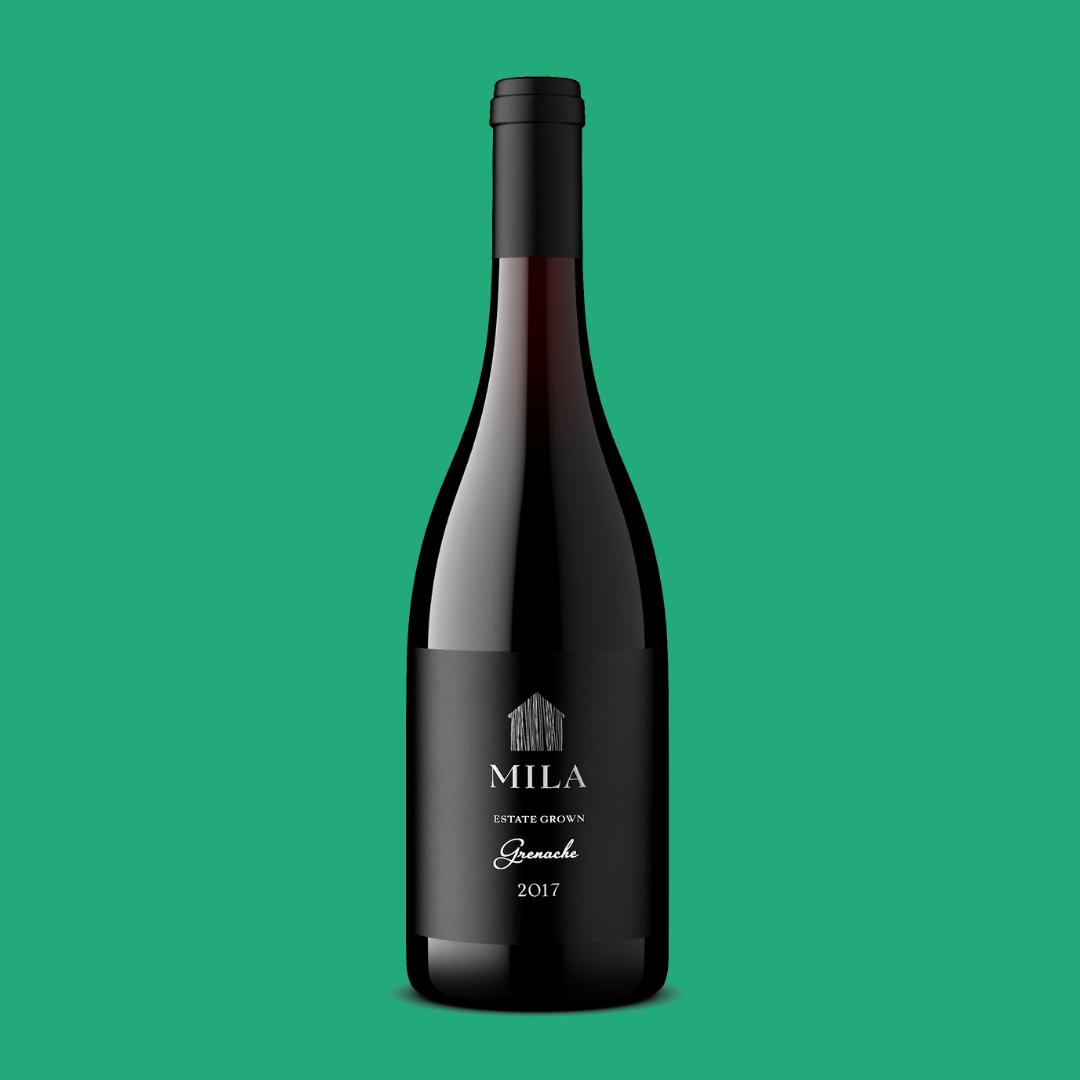 Grenache bottle with green background