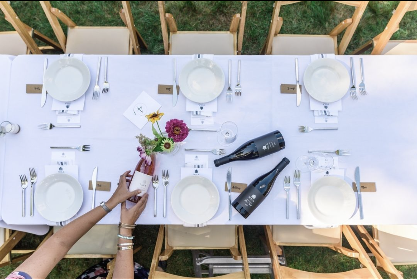 summer table set outdoors with Mila wines